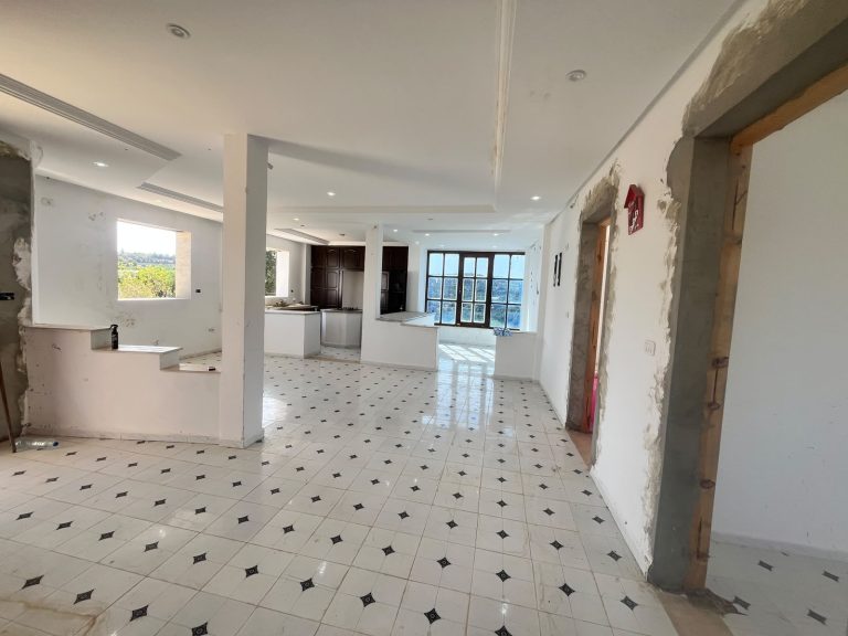 Maison avec jardin bâtie sur un terrain de 500 m